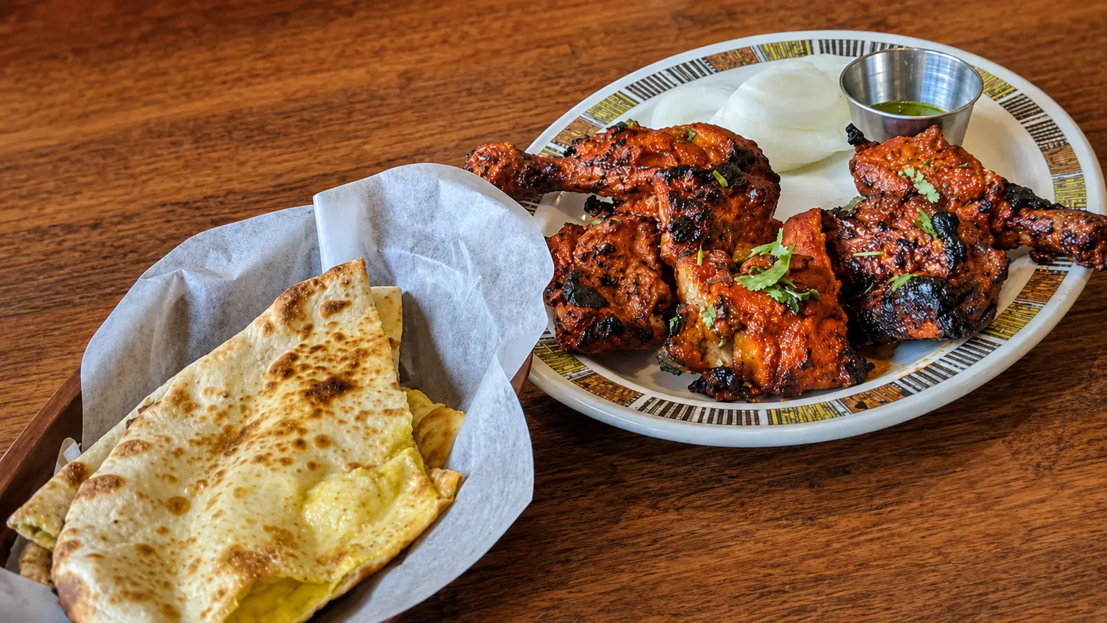 Tandoori chicken at Saffron Indian Bistro Lake Louise – yogurt-marinated chicken grilled in the clay tandoor